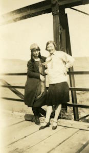 People posing with bridges