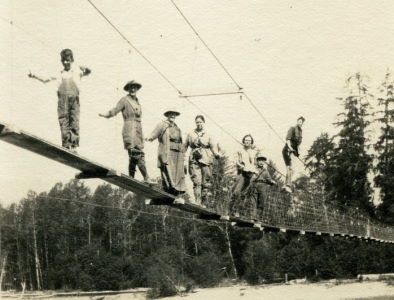 People posing with bridges