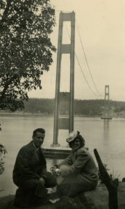 People posing with bridges