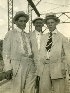 People posing with bridges