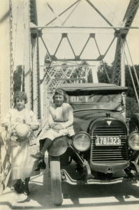 People posing with bridges